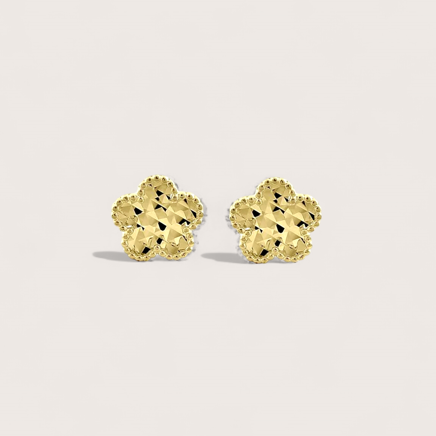 Solid 14 Gold, Clover Flower Stud earrings with an intricate diamond cut pattern, for sparkling finish. Matching pendant also available.