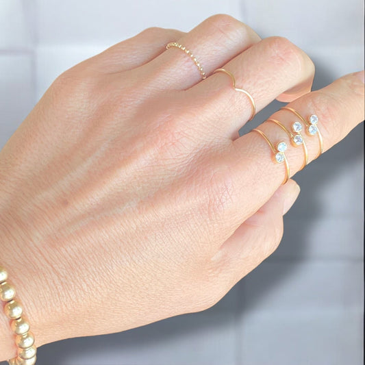 model wearing 14k Gold Ball Chain Ring