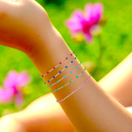 colorful enamel bead bracelets on model