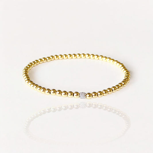 14K Gold Beaded Diamond Bead Bracelet - Solid 14K yellow gold beads in a stretchy fit bracelet.