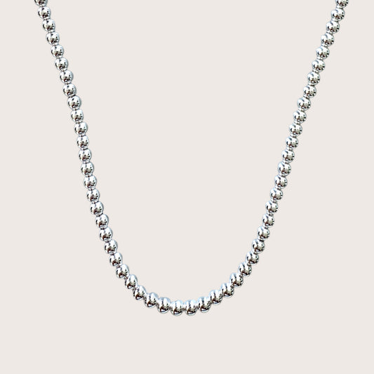 Sterling Silver Bead Necklace – A Timeless, Minimalist Staple
Add a touch of elegance to your jewelry collection with our Sterling Silver Bead Necklace. Featuring high-quality 925 sterling silver beads, this delicate yet durable chain is perfect for everyday wear, layering, or as a statement on its own.