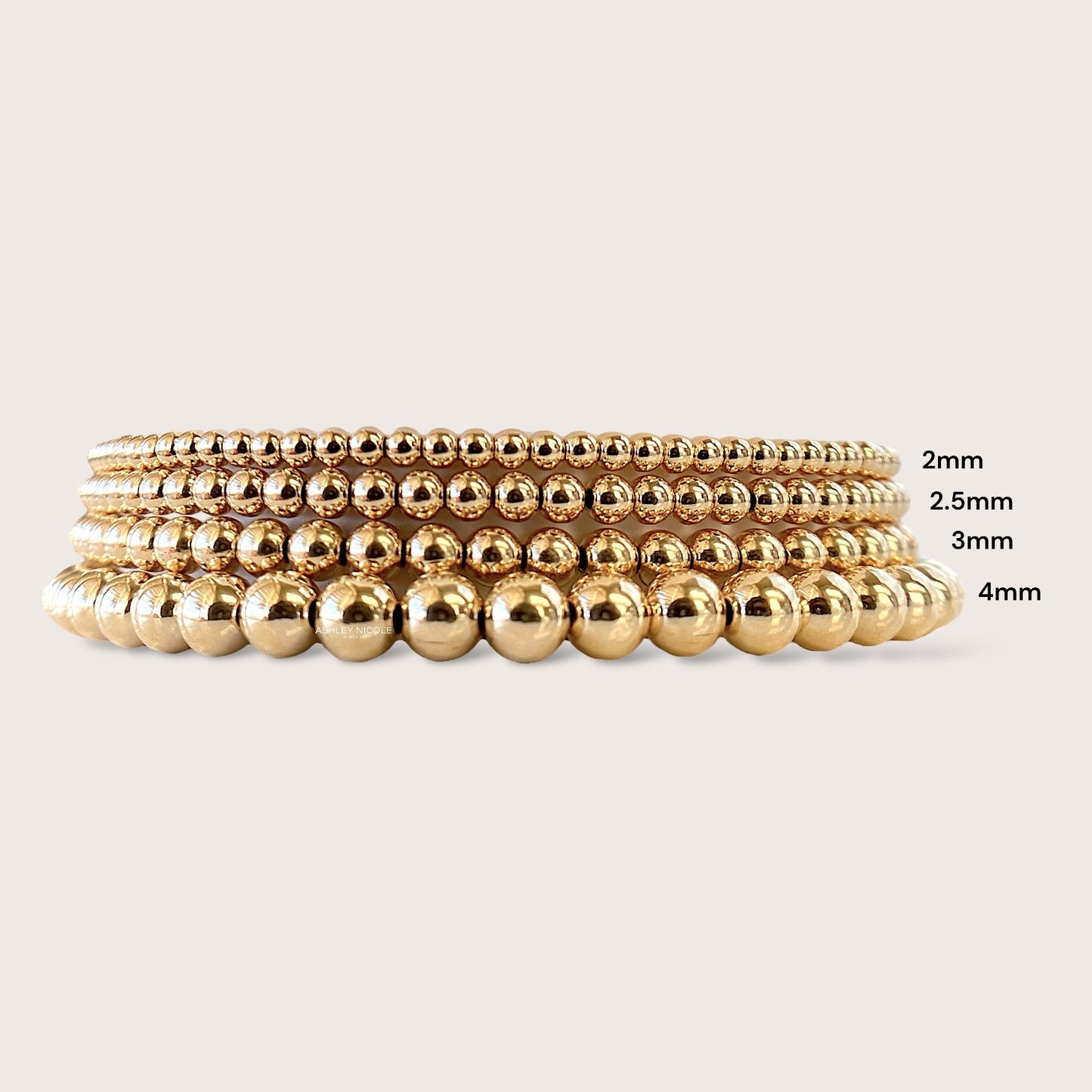 14k gold filled beaded bracelets, shown in 2mm, 2.5mm, 3mm, and 4mm bead widths.