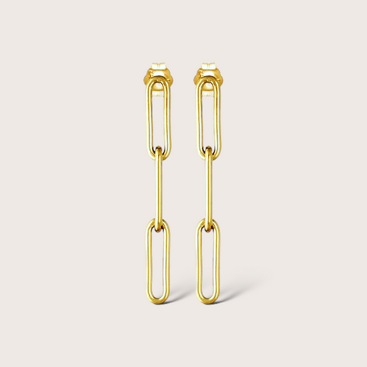 Gold filled paperclip dangle earrings with 1.5” drop on white background