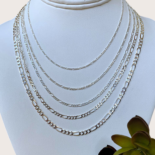 Layered 925 Bright Silver Figaro chain necklaces from 1.5mm to 5mm widths