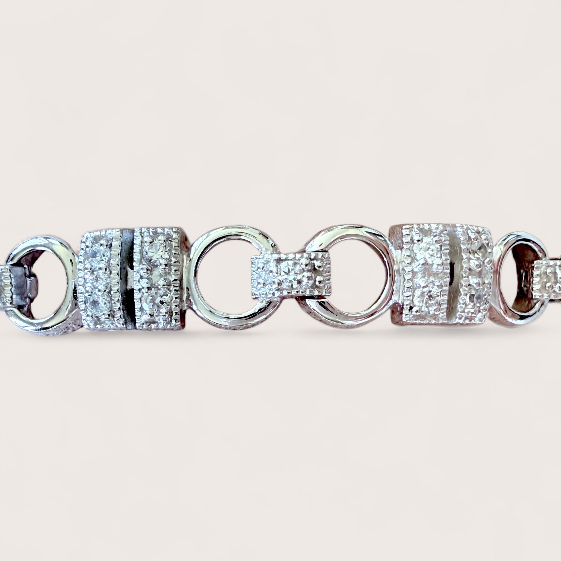 Close-up of snaffle bit design in solid sterling silver