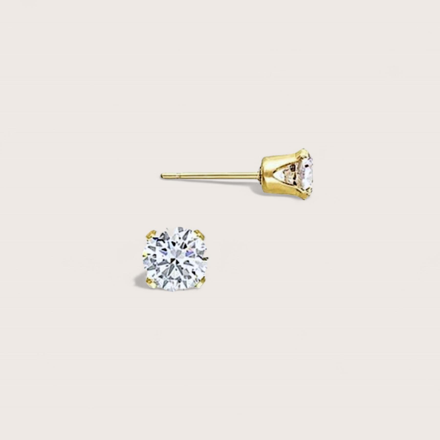 Gold Cubic Zirconia Earrings. Featuring 14K yellow gold finish and high brilliance diamond simulants, these earrings come in 4 sizes for all your ear-stacking desires