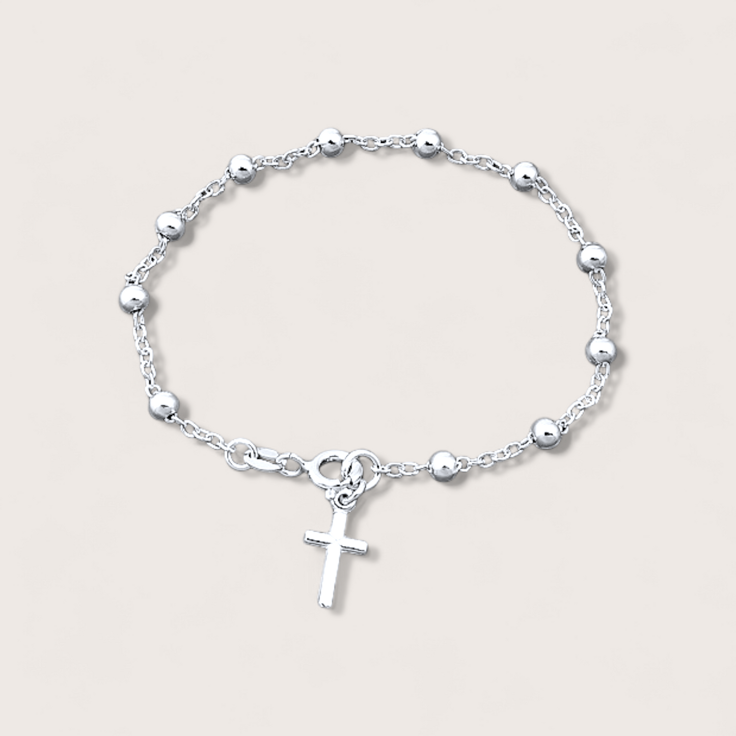 Enhance your spiritual and fashionable attire with this exquisite rosary bead bracelet crafted from 925 sterling silver. The bracelet features a delicate Christian cross pendant, elegantly crafted and finished in lustrous sterling silver.