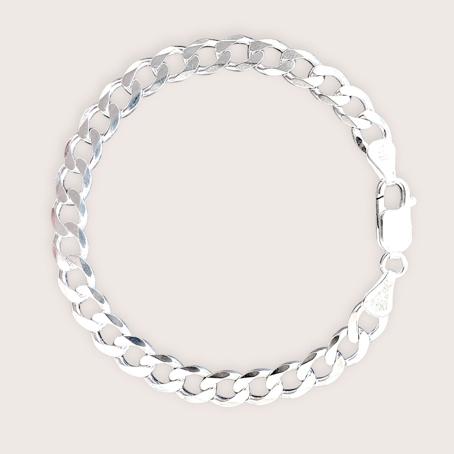 A silver curb chain bracelet with a lobster clasp closure.