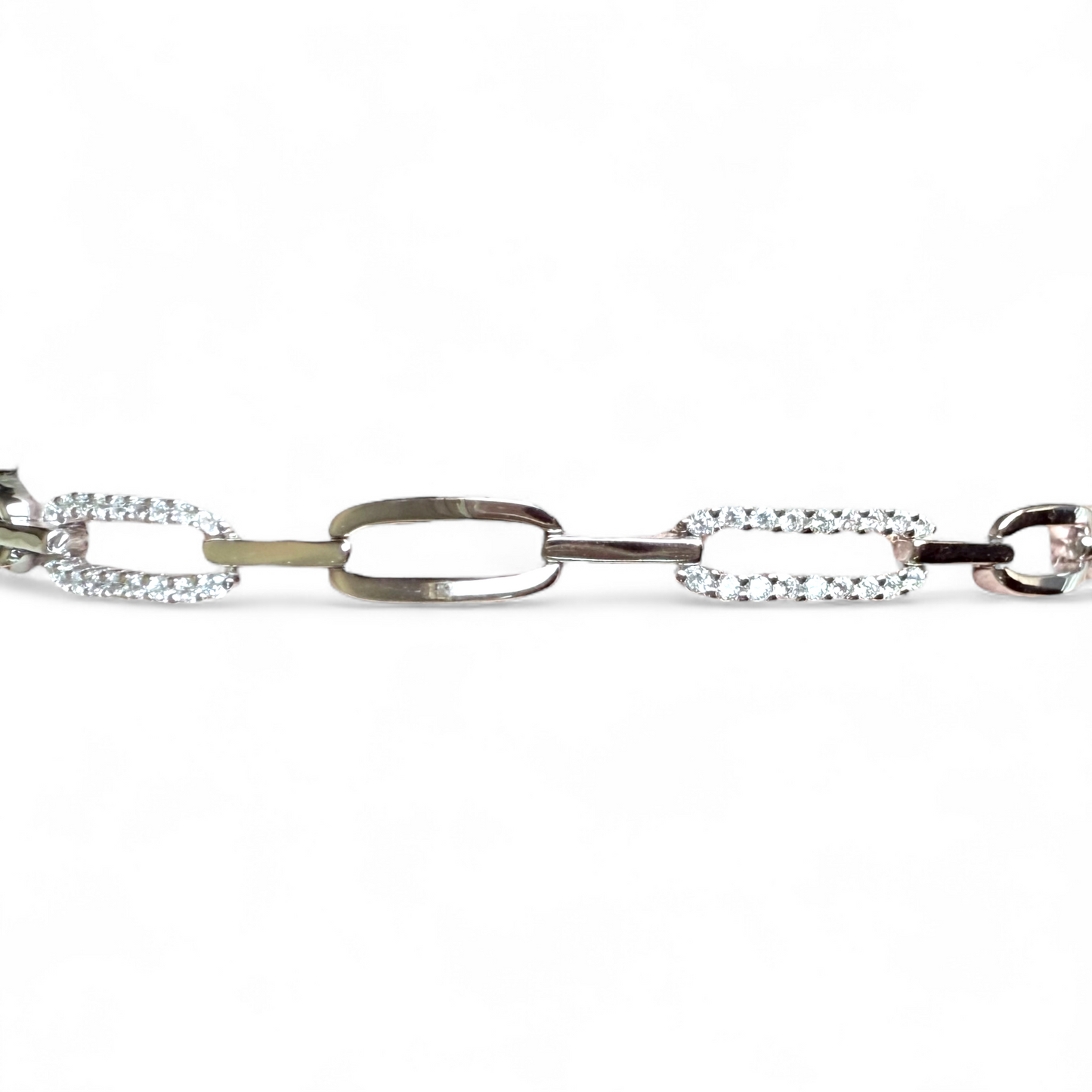 Close-up of diamond CZ oval links and polished silver links