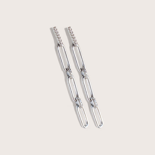 Close up of Silver Paperclip Chain Dangle Drop Earrings with sparkling CZ links