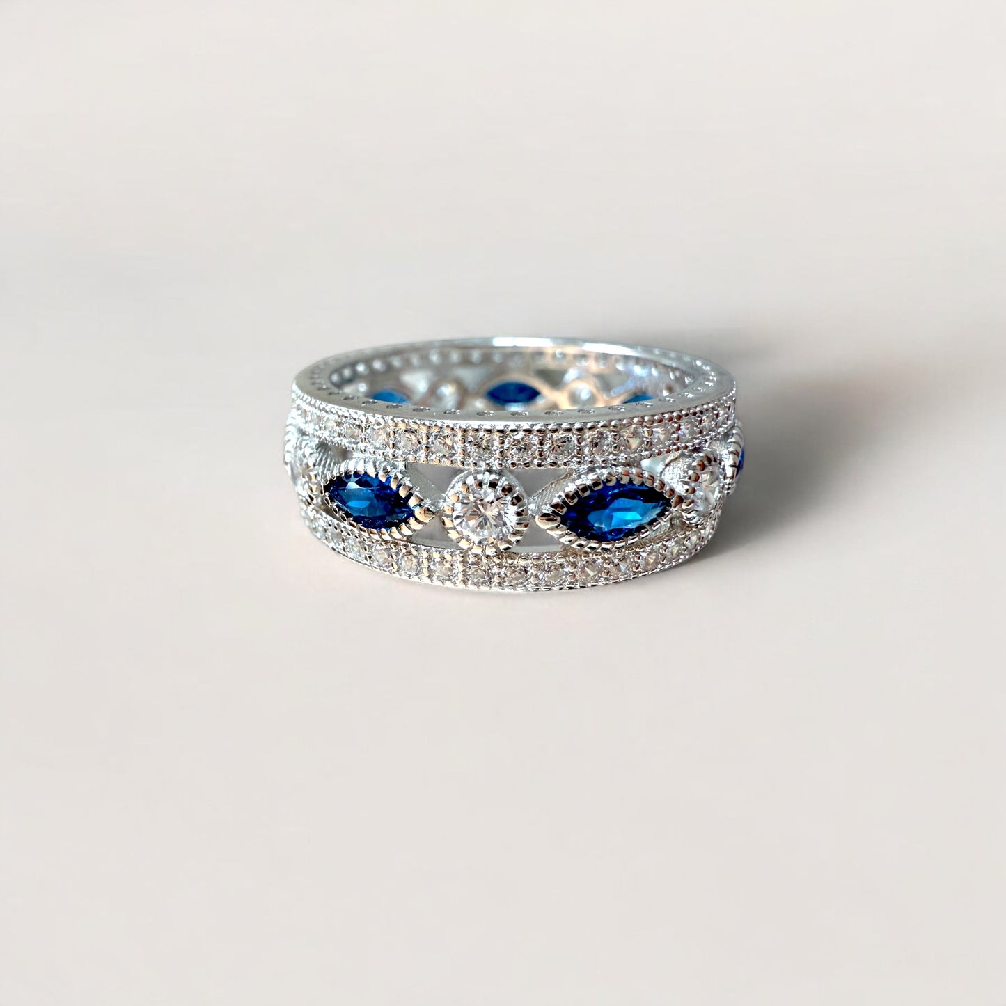 Close up of a Sterling Silver Blue Sapphire Eternity Ring