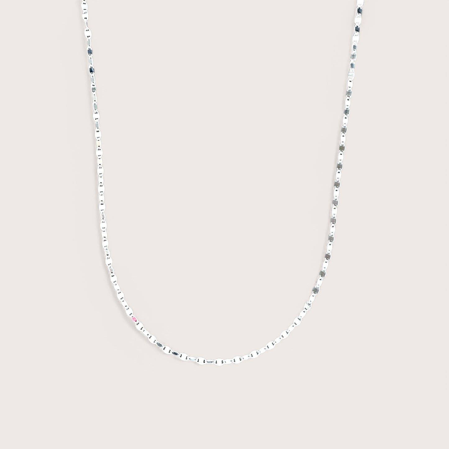 Silver Mirror Chain Necklace. Made of Italian 925 sterling silver, this captivating necklace features a delicate 3.2mm Valentino Mirror Chain adorned with shimmering oval sequins. Perfect for everyday wear or special occasions, it is sure to become a treasured piece in your jewelry collection or a thoughtful gift for a loved one.