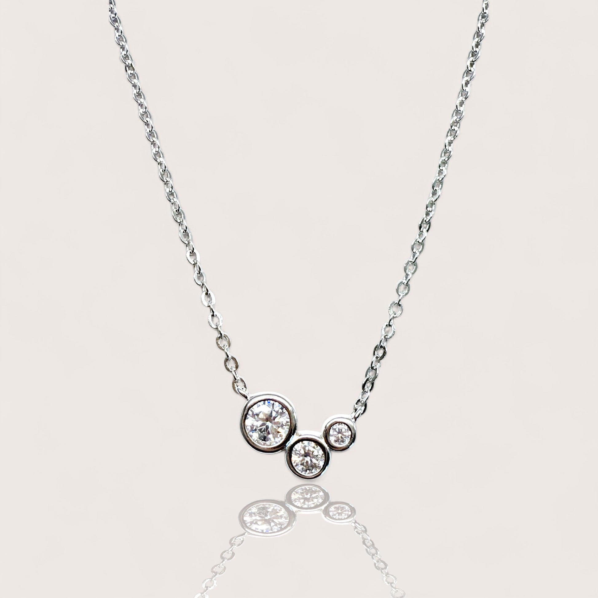 925 Sterling Silver Rhodium Plated. bezel-set round moissanite cluster pendant necklace