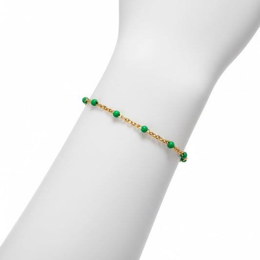 14K Gold Filled Emerald Green Enamel Bead Bracelet worn on wrist — waterproof satellite station chain bracelet by Ashley Nicole Jewelry