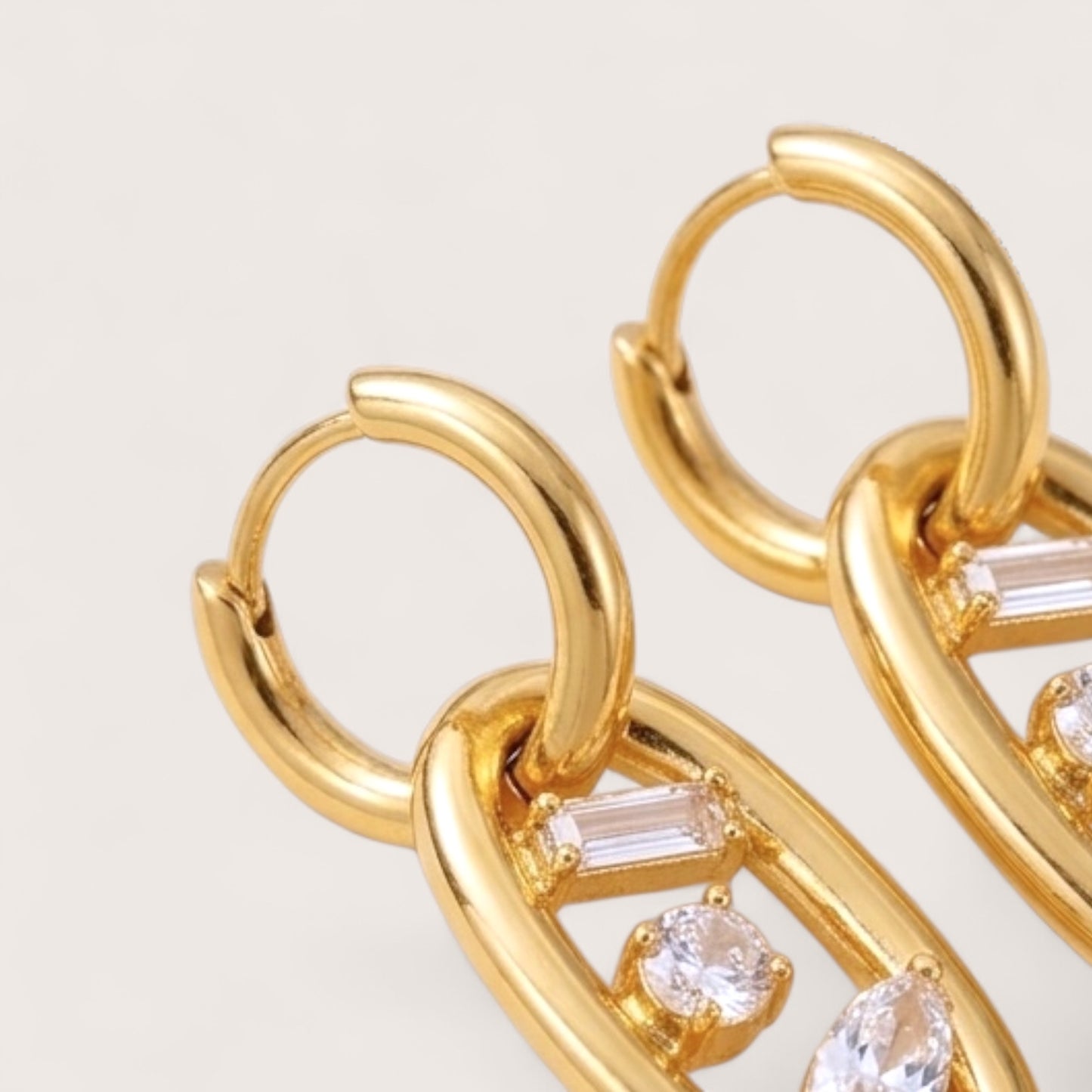 Oval Link Floating CZ Huggie Earrings⁠