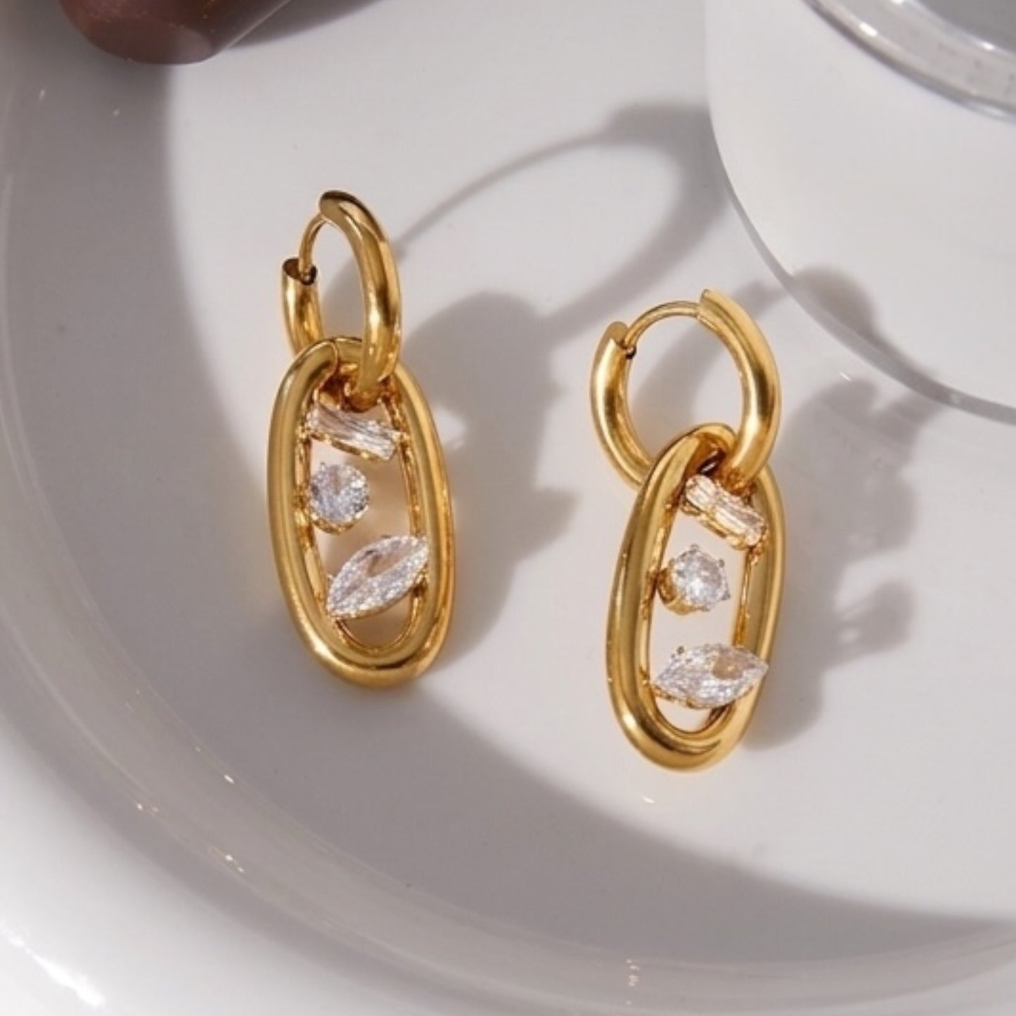 Oval Link Floating CZ Huggie Earrings⁠