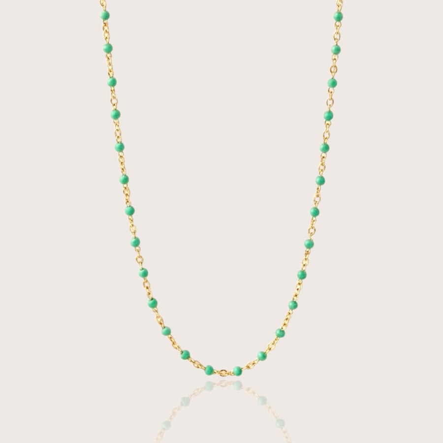 14K gold filled emerald green enamel beaded station necklace on white background