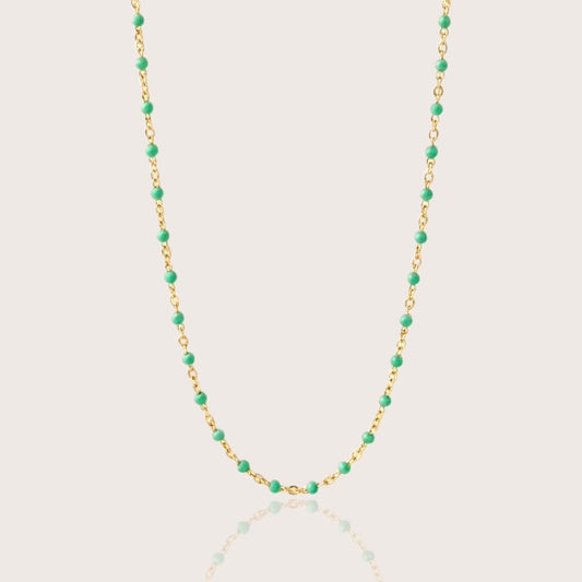 14K gold filled emerald green enamel beaded station necklace on white background