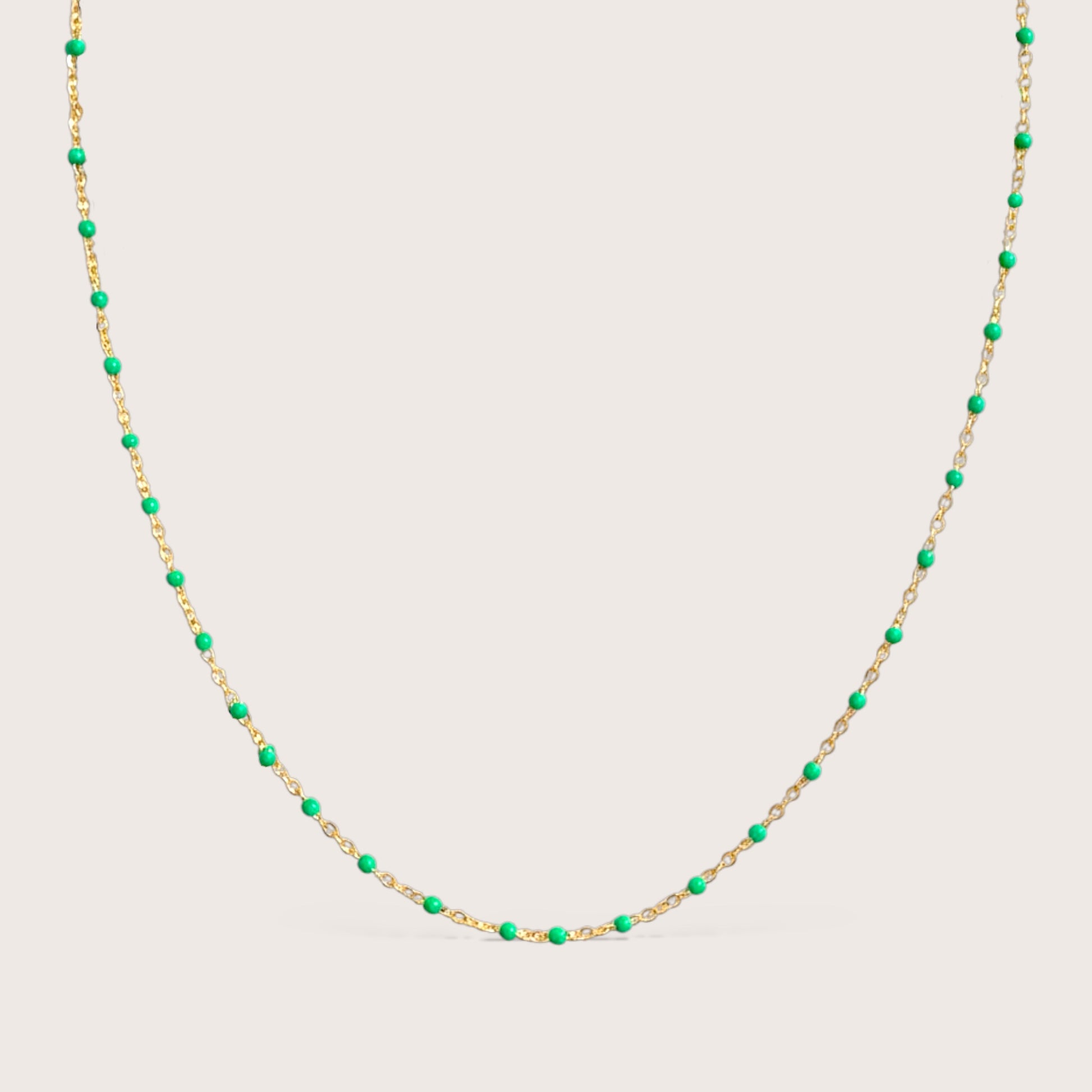 14K gold filled emerald green enamel beaded station necklace on white background