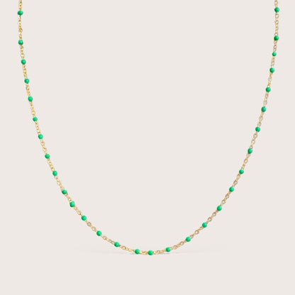14K gold filled emerald green enamel beaded station necklace on white background