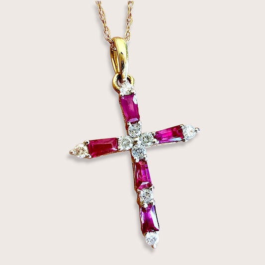 Close up of 14K Solid Yellow Gold Ruby and Diamond Cross Necklace on an 18 inch chain showing the hand-set precious red rubies and brilliant diamonds.