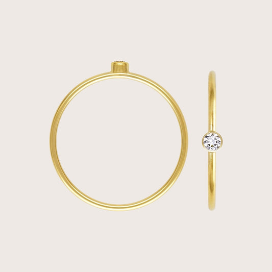 Side profile view showing low-profile flush bezel setting and slim 18-gauge 14K gold filled band