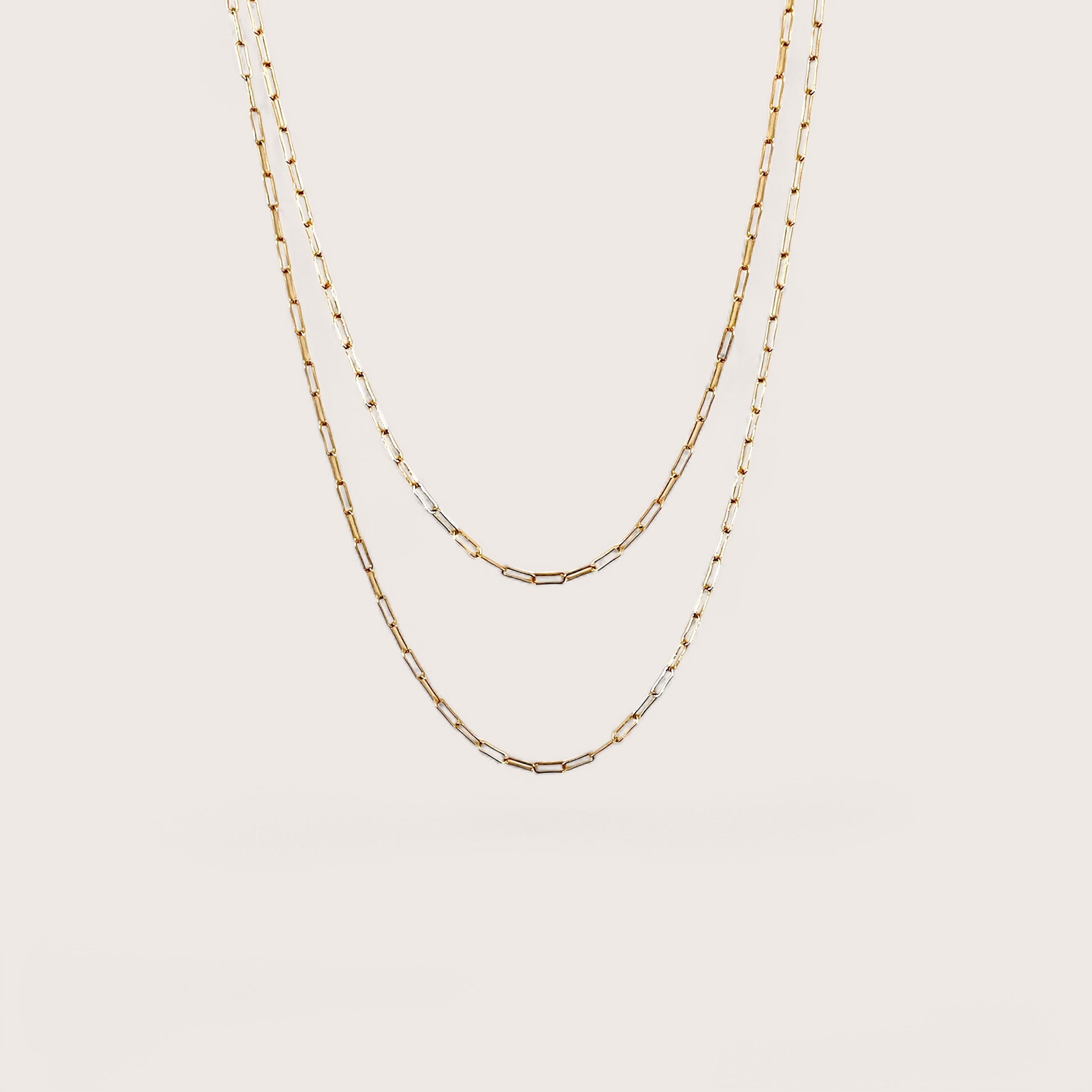 close-up flat lay of a 2.0mm 14K gold-filled flat link paperclip chain necklace with a high-polish finish by Ashley Nicole Jewelry
