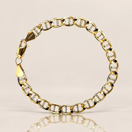 Polished gold-filled flat mariner bracelet arranged in a circle with a reflection beneath by Ashley Nicole Jewelry⁠