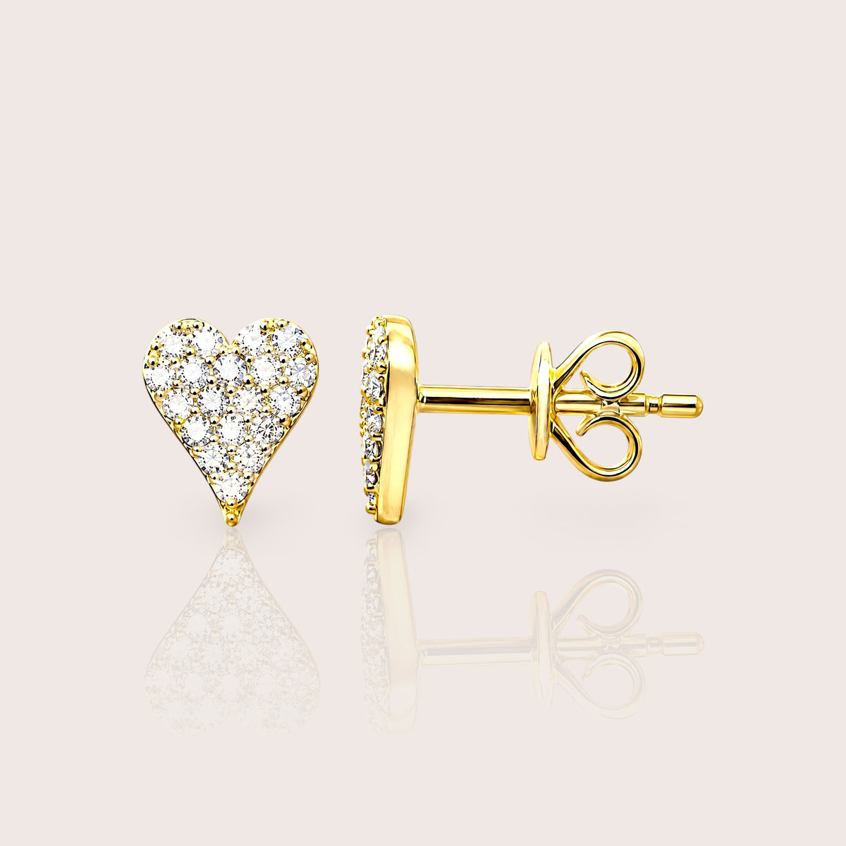 Pair of 14K yellow gold pavé diamond heart stud earrings