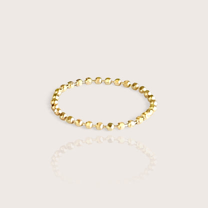 A 14K gold bead chain ring with a diamond-cut finish, providing a shiny and sparkling appearance.