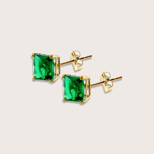 Pairs of 3.4mm and 4.3mm solid 14K yellow gold emerald princess square cut stud earrings displayed in premium signature gift packaging from Ashley Nicole Jewelry, CA, USA.