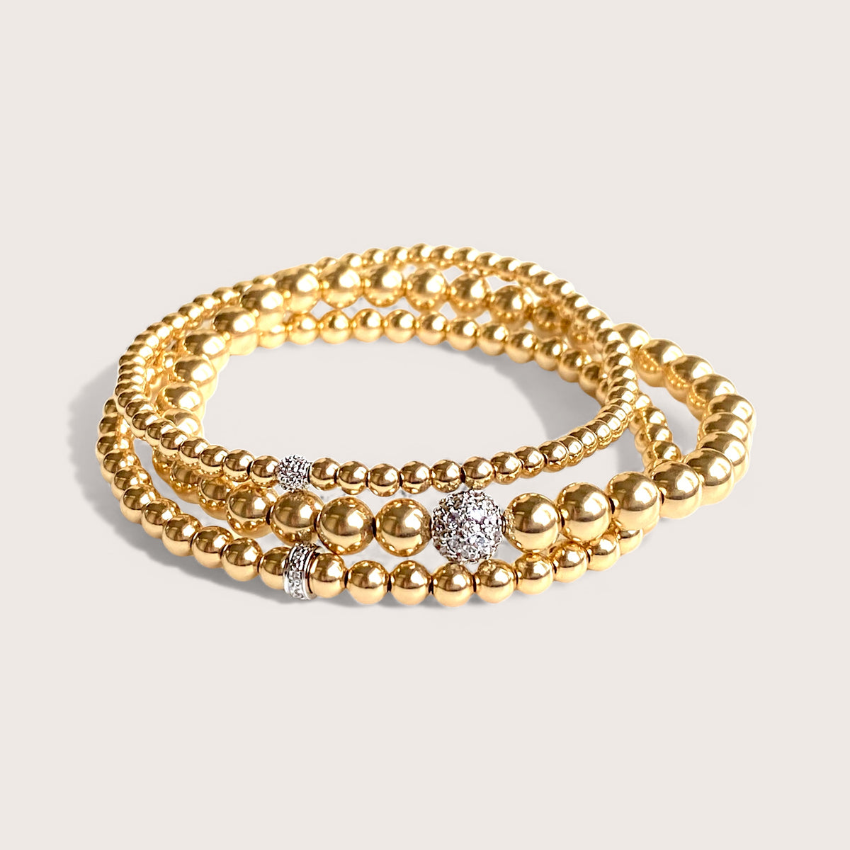 14K gold 3mm diamond bracelet stacked with fine jewelry — stackable gold beaded bracelet by Ashley Nicole Jewelry