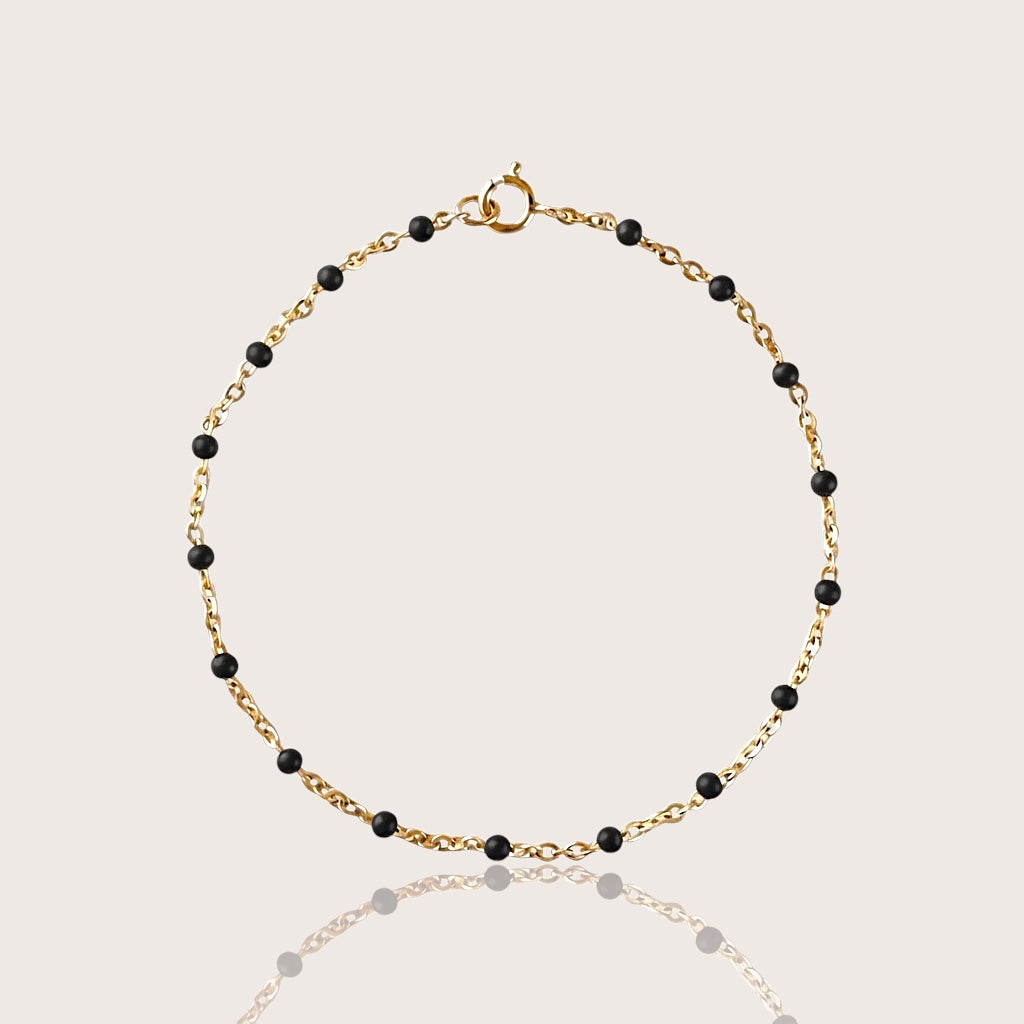 14K Gold Filled Station bracelet with black beads stationed on dainty gold chain