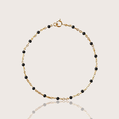14K Gold Filled Station bracelet with black beads stationed on dainty gold chain