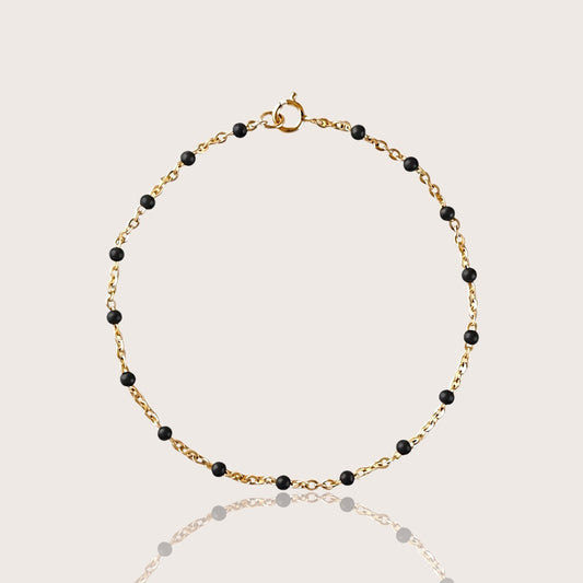 14K Gold Filled Station bracelet with black beads stationed on dainty gold chain