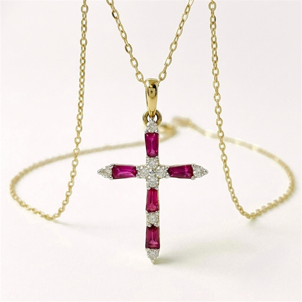 14K Solid Yellow Gold Ruby and Diamond Cross Necklace on an 18 inch chain showing the hand-set precious red rubies and brilliant diamonds.