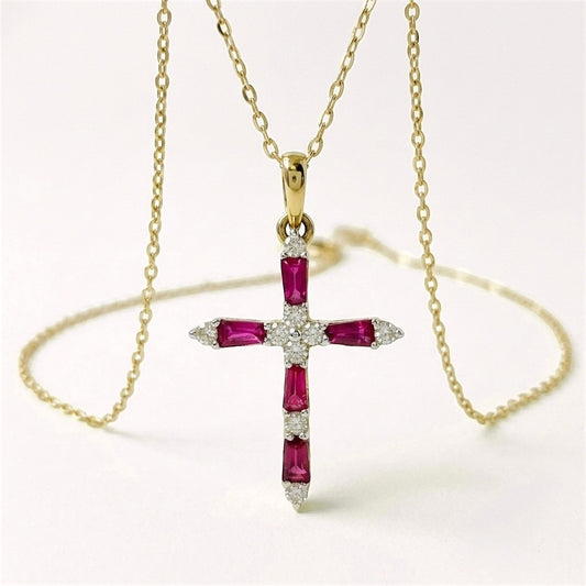 14K Solid Yellow Gold Ruby and Diamond Cross Necklace on an 18 inch chain showing the hand-set precious red rubies and brilliant diamonds.