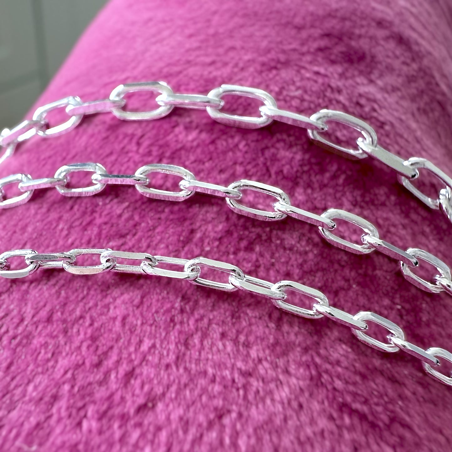 Comparison view of 2mm 3mm and 4mm solid 925 sterling silver marina anchor link chain bracelets stacked together by Ashley Nicole Jewelry.