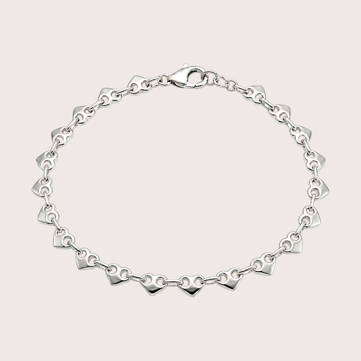 Delicate silver heart link bracelet arranged in an oval with a lobster clasp at the top.