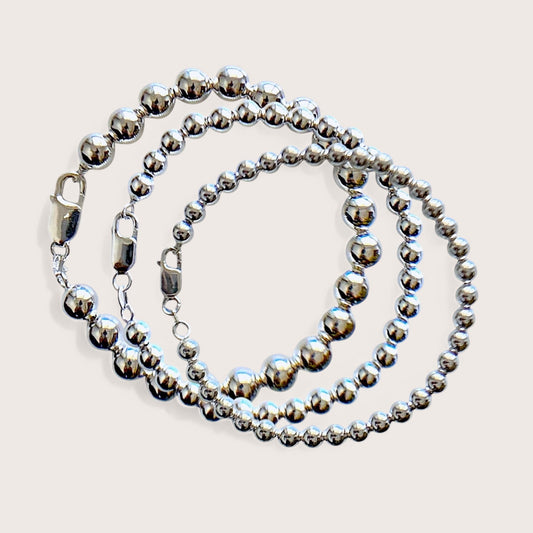  silver beaded chain bracelet with a lobster claw closure in 5mm 6mm or 8mm widths