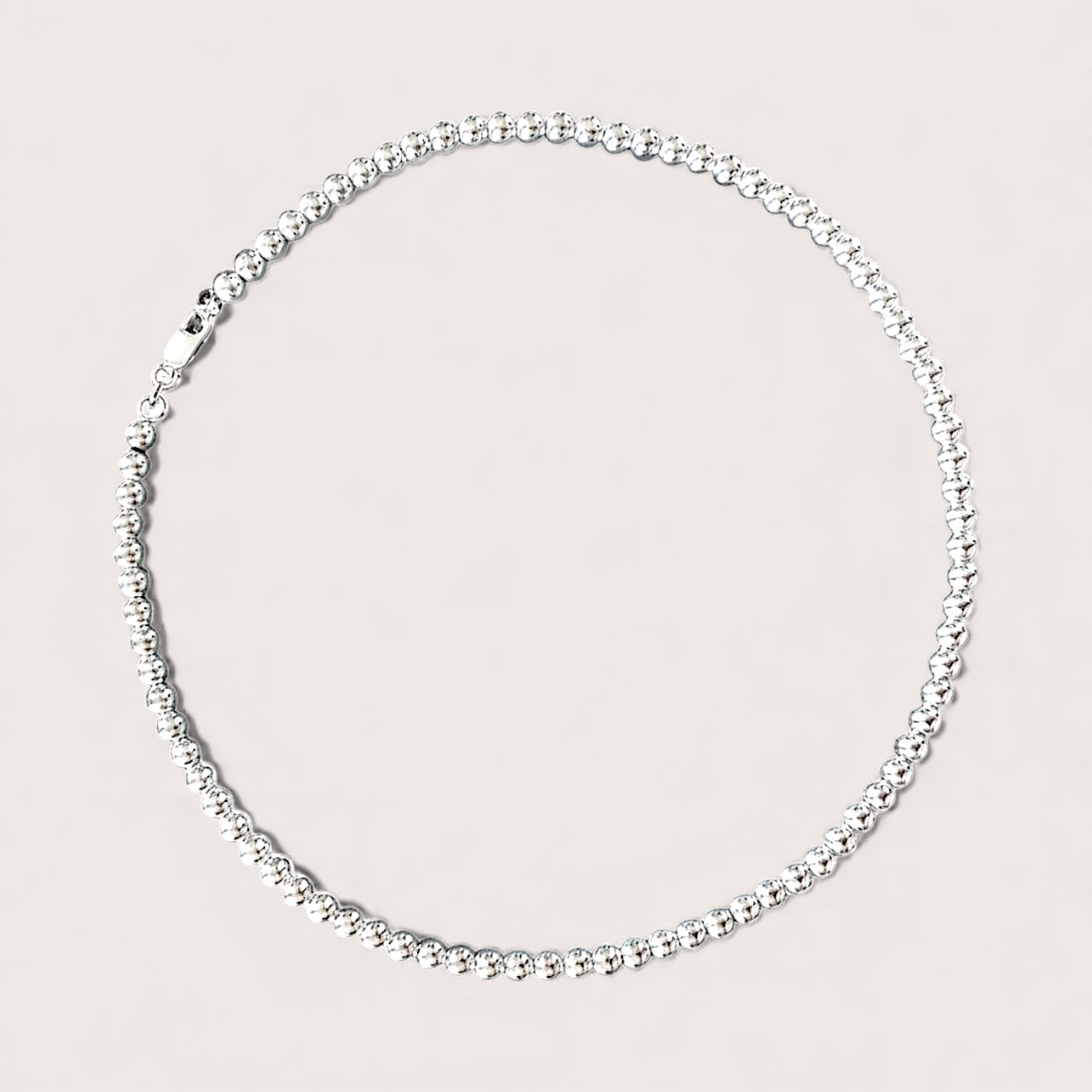 Close-up of Bright Mirror Silver Beads on 925 Sterling Silver Necklace with a lobster c lasp