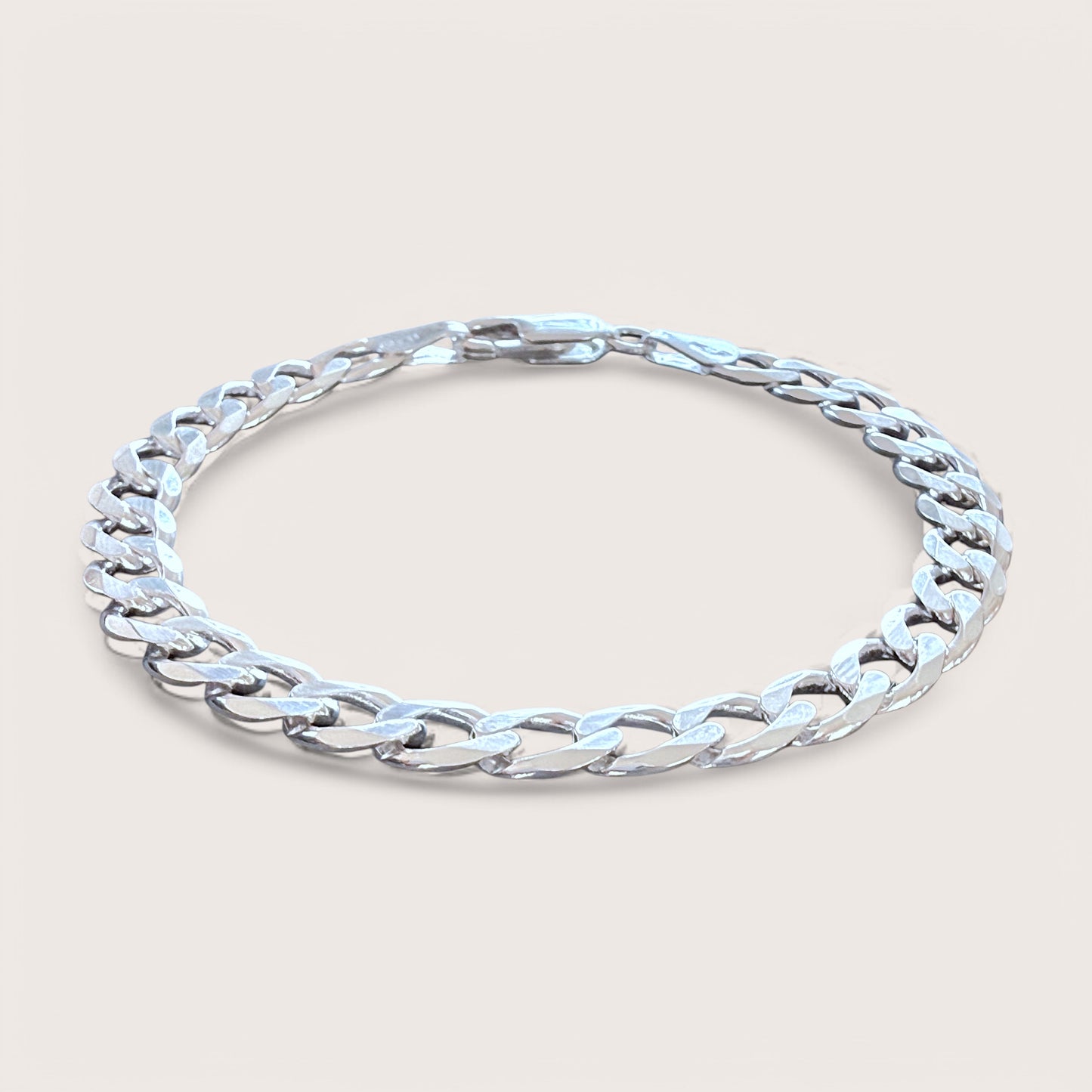 Side view of Sterling Silver Diamond Cut Curb Link Bracelet