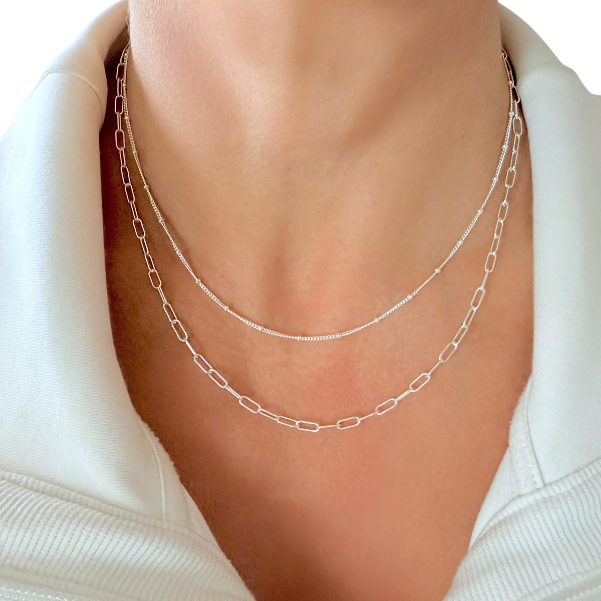 925 Italian sterling silver double strand paperclip and satellite chain necklace, adjustable 16-18 inches, worn by a woman
