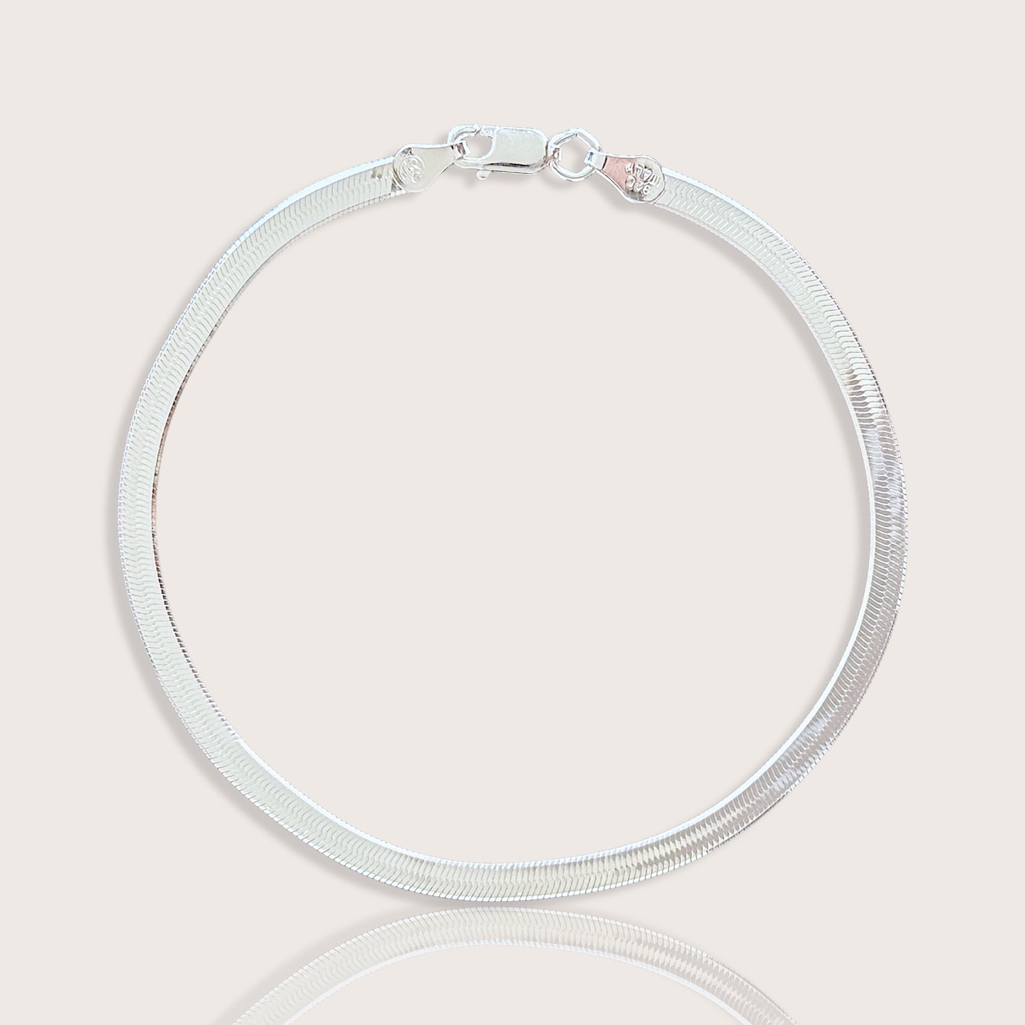 925 Silver Herringbone Bracelet with a lobster clasp closure