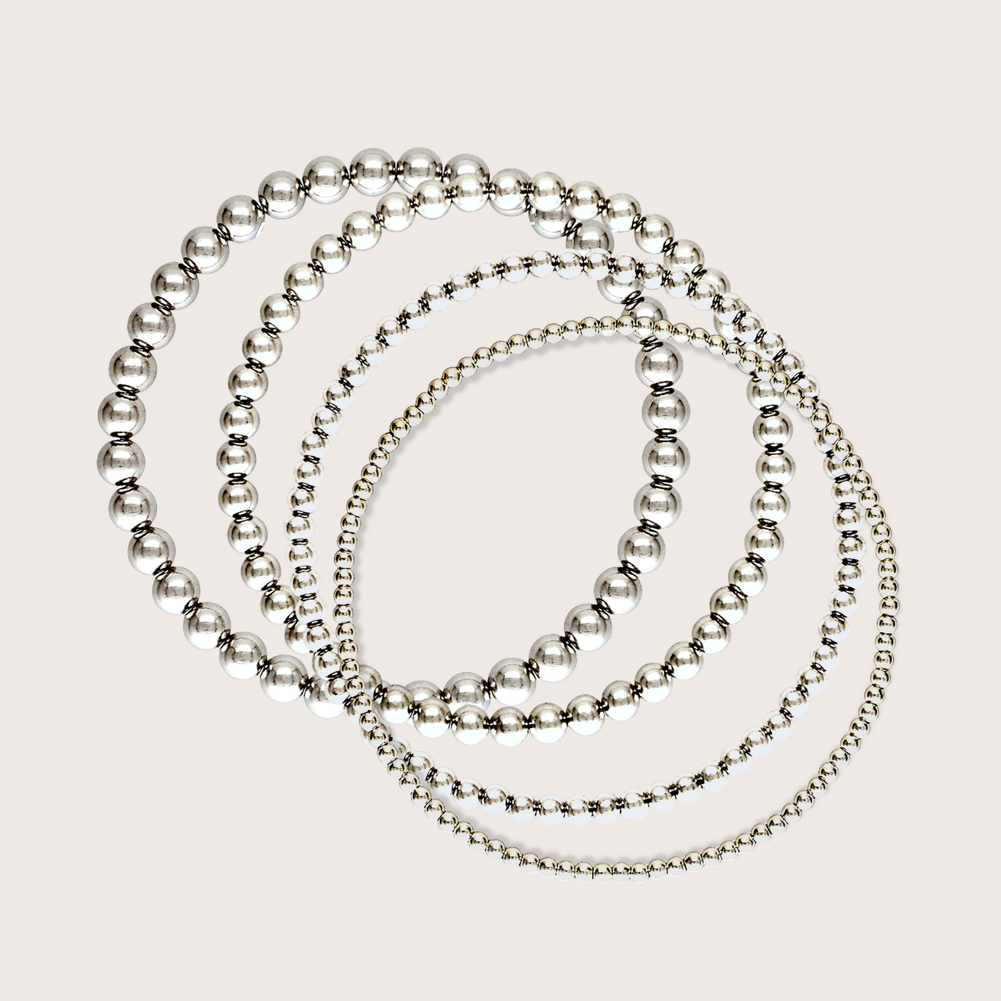 Close up of Sterling silver beaded bracelets from 2.5mm - 5mm