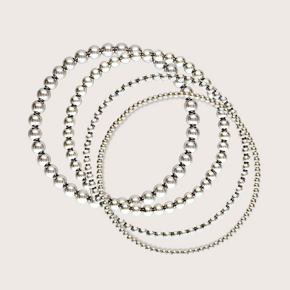Close-up of 925 sterling silver beaded bracelets side by side — 2mm to 5mm bead widths