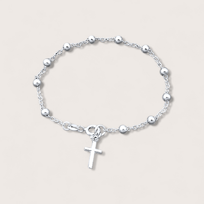 Solid 925 sterling silver Rosemary bracelet featuring a delicate cross charm, elegantly crafted and finished in lustrous sterling silver.