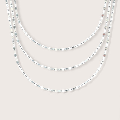925 Italian sterling silver flat mirror link chain necklace displaying its highly reflective polished surfaces on a clean white background