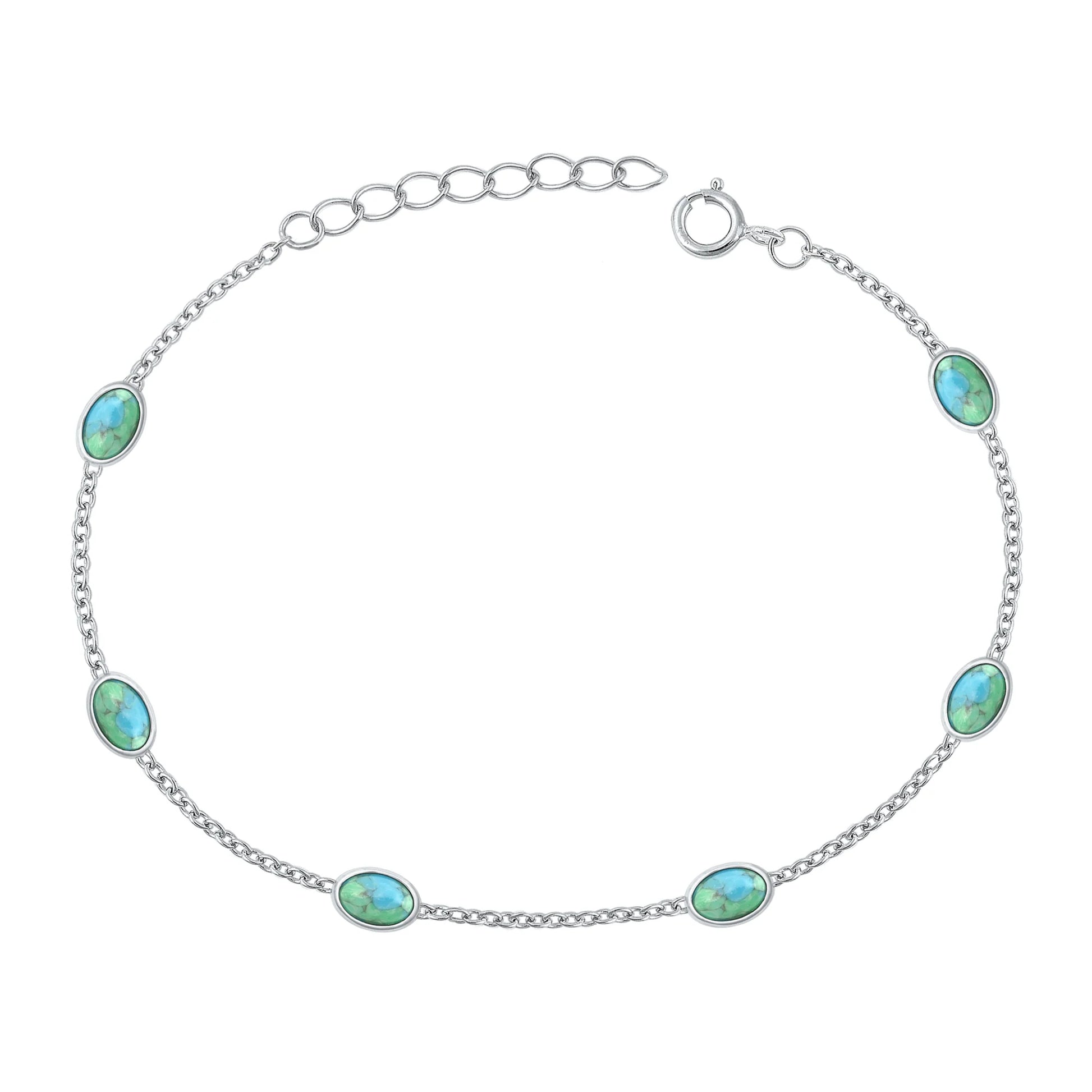 Silver bracelet with turquoise stones on a white background