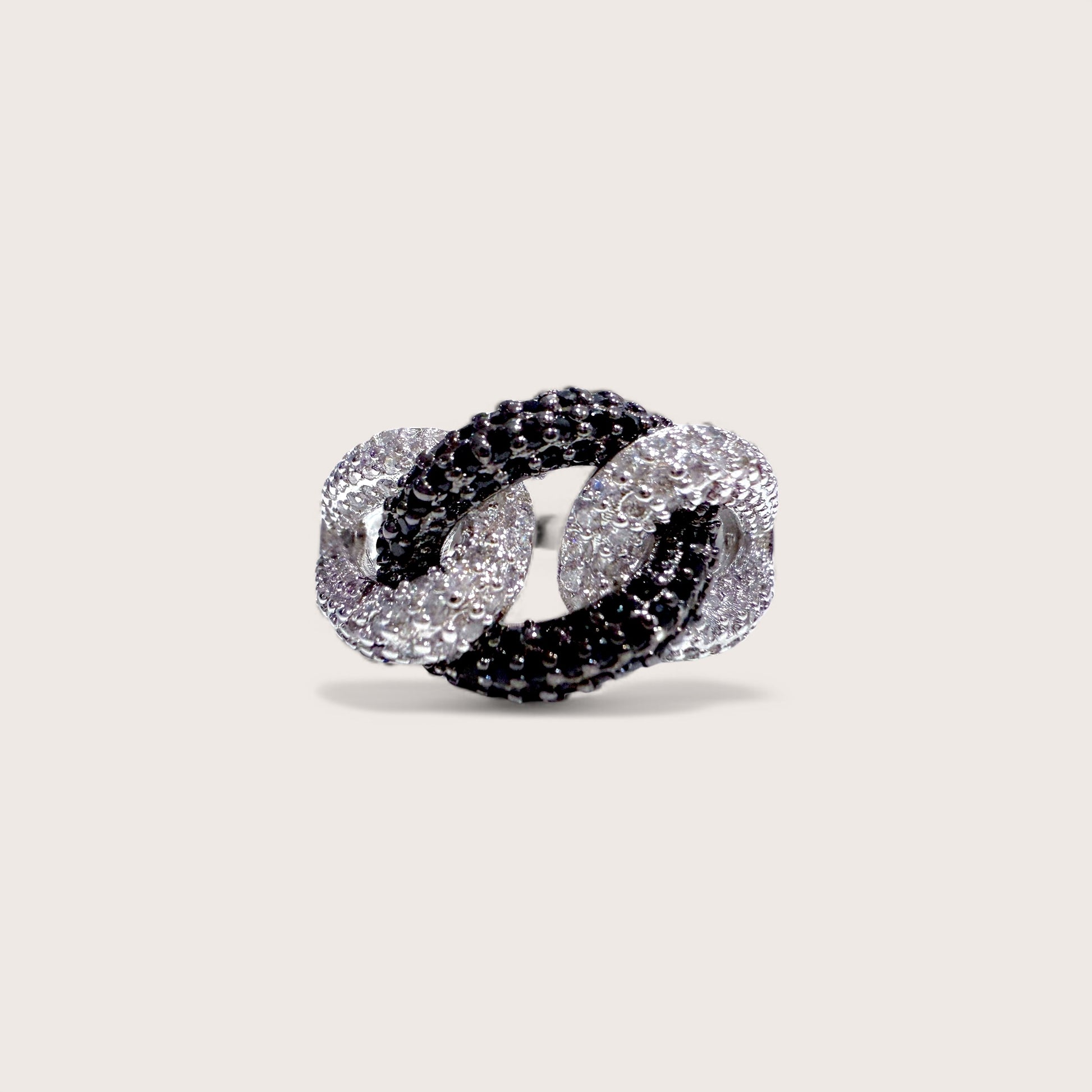 Front of 925 Sterling Silver Interlocking chain link rings with , black and clear CZ Stones 